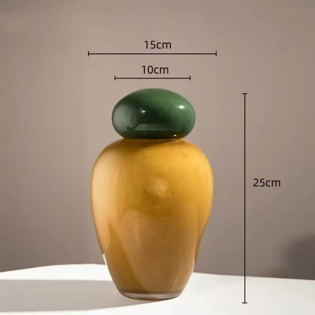 colored glass vases with rounded stoppers