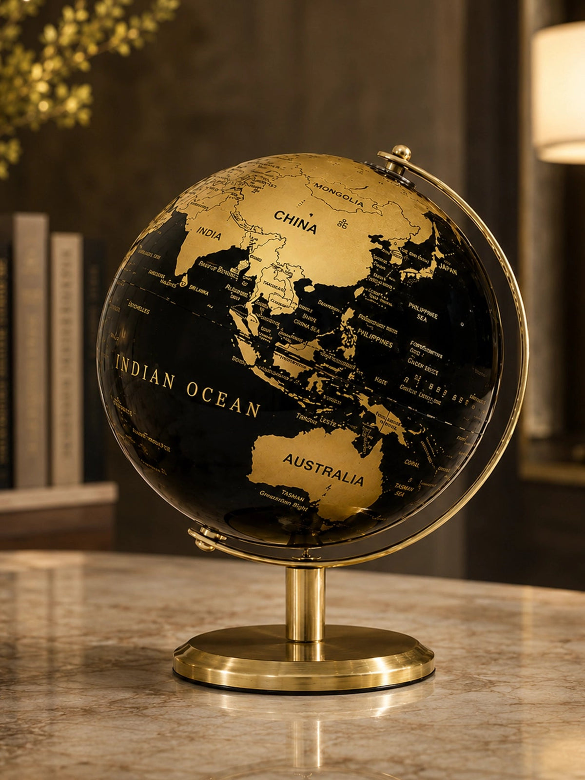 vintage black gold world globe
 ⁠