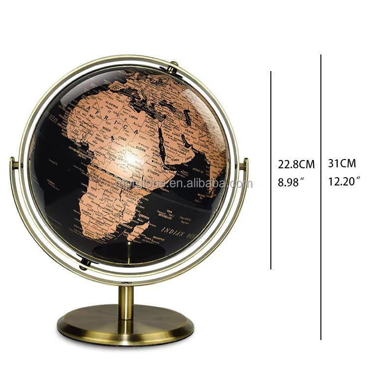 vintage black gold world globe
 ⁠